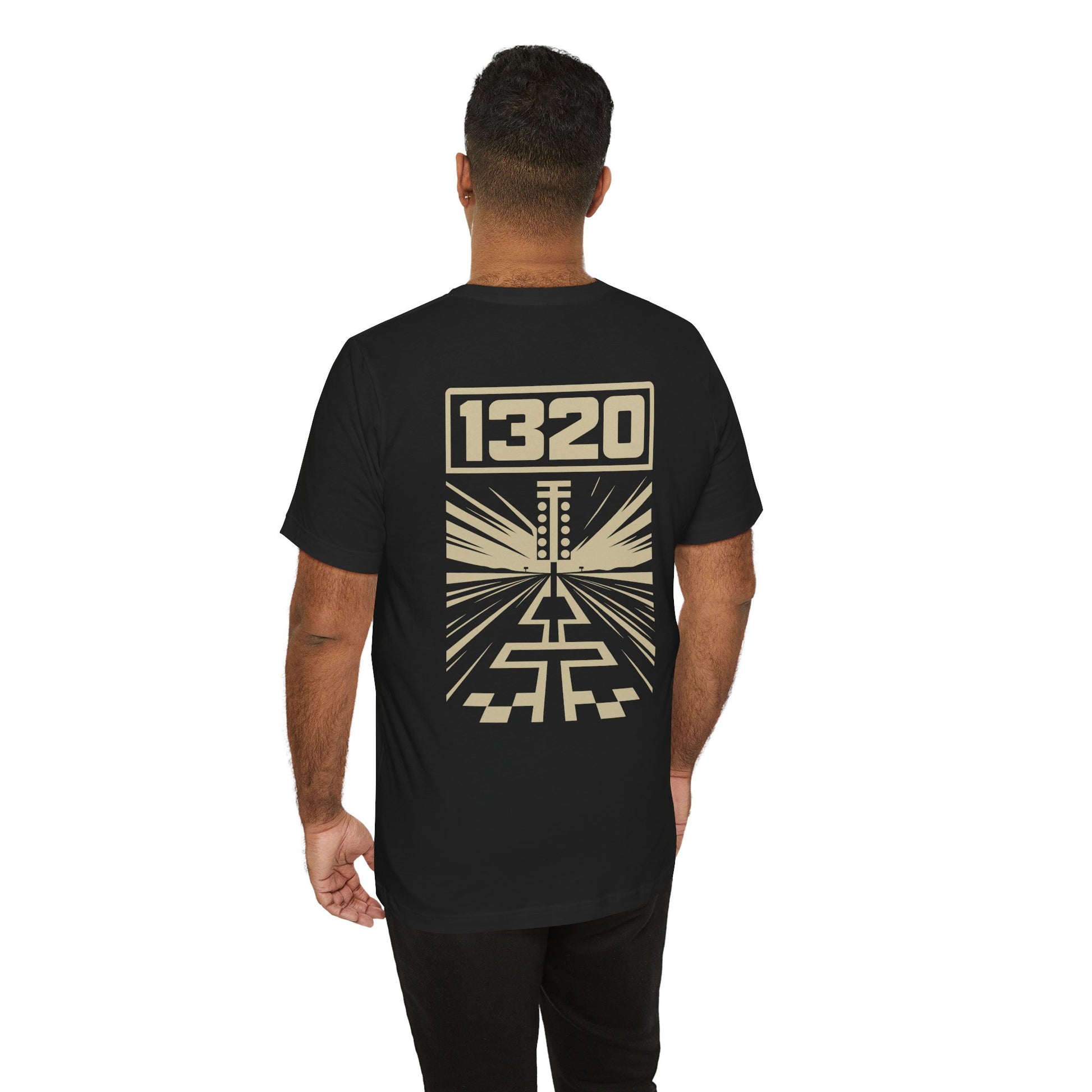 Person wearing a black t-shirt with '1320' design on the back against a white background