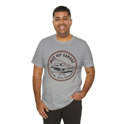 Man wearing a gray t-shirt with a graphic design and text 'Nice Rip Garage Get that old fart ripping again' on a white background