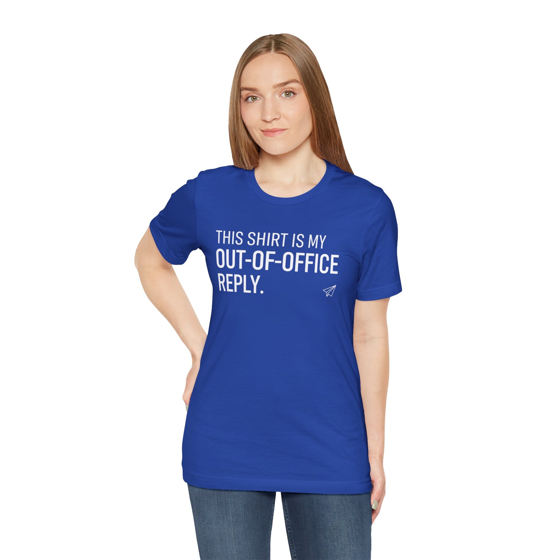 Person wearing a blue t-shirt with text 'This shirt is my out-of-office reply' on a white background