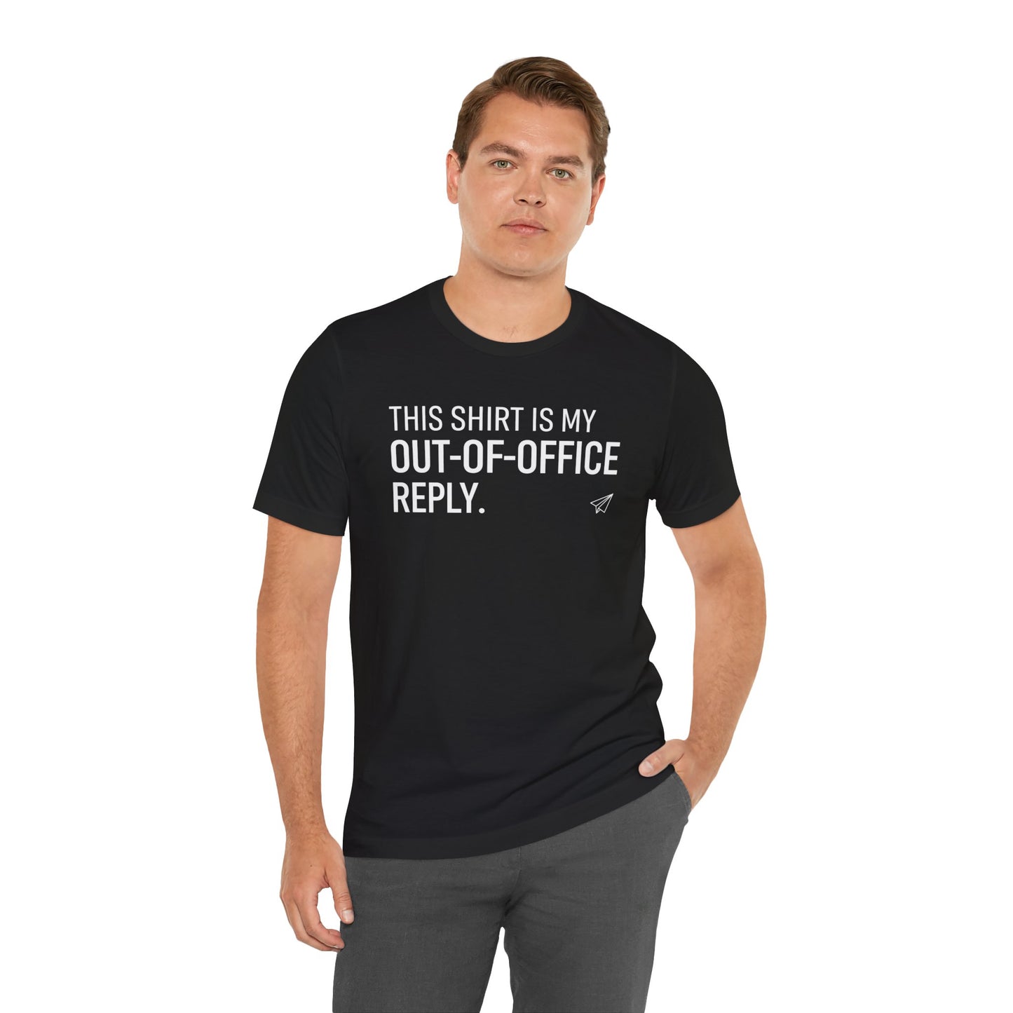 Man wearing a black t-shirt with text 'This shirt is my out-of-office reply' on a white background