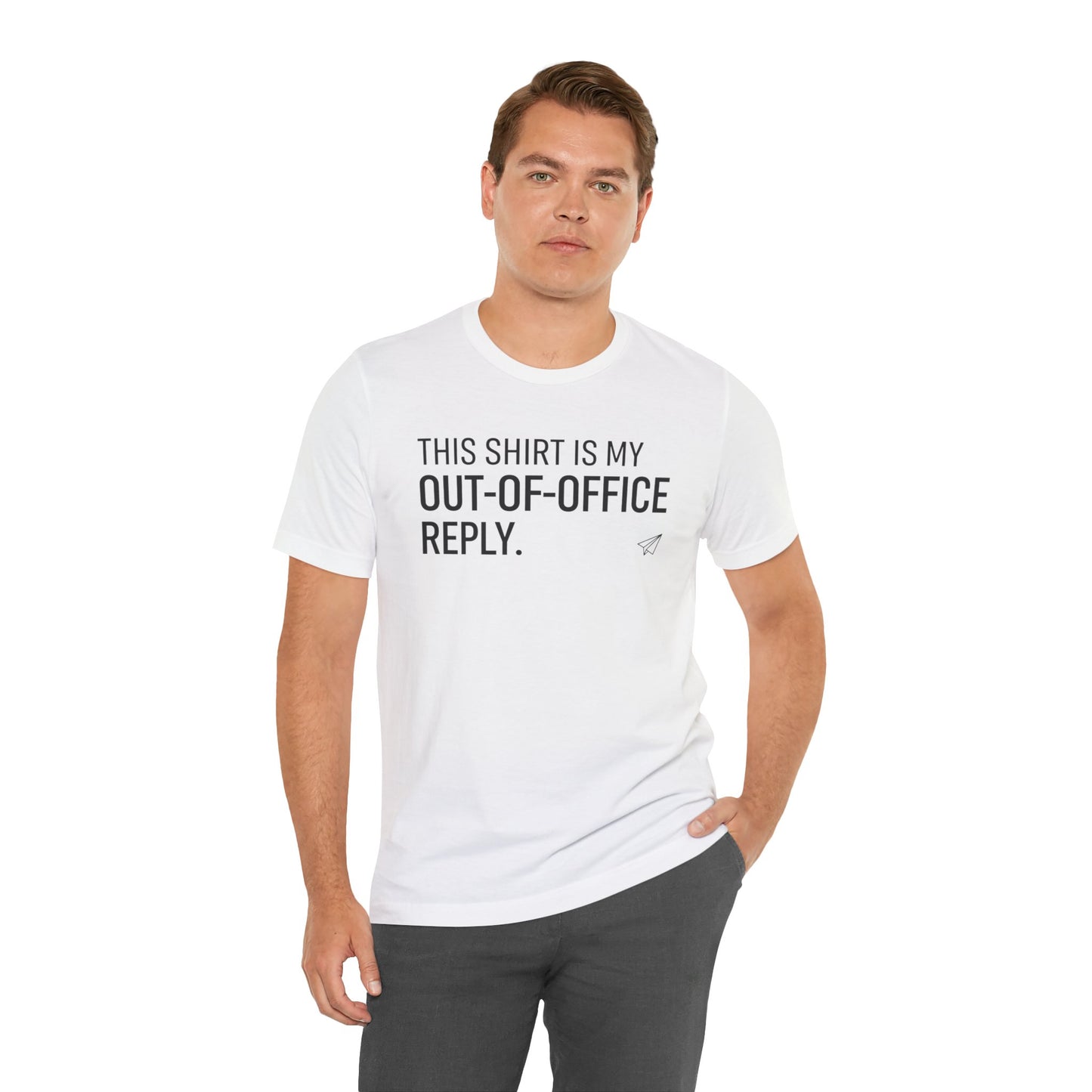 Man wearing a white t-shirt with text 'This shirt is my out-of-office reply' on a white background