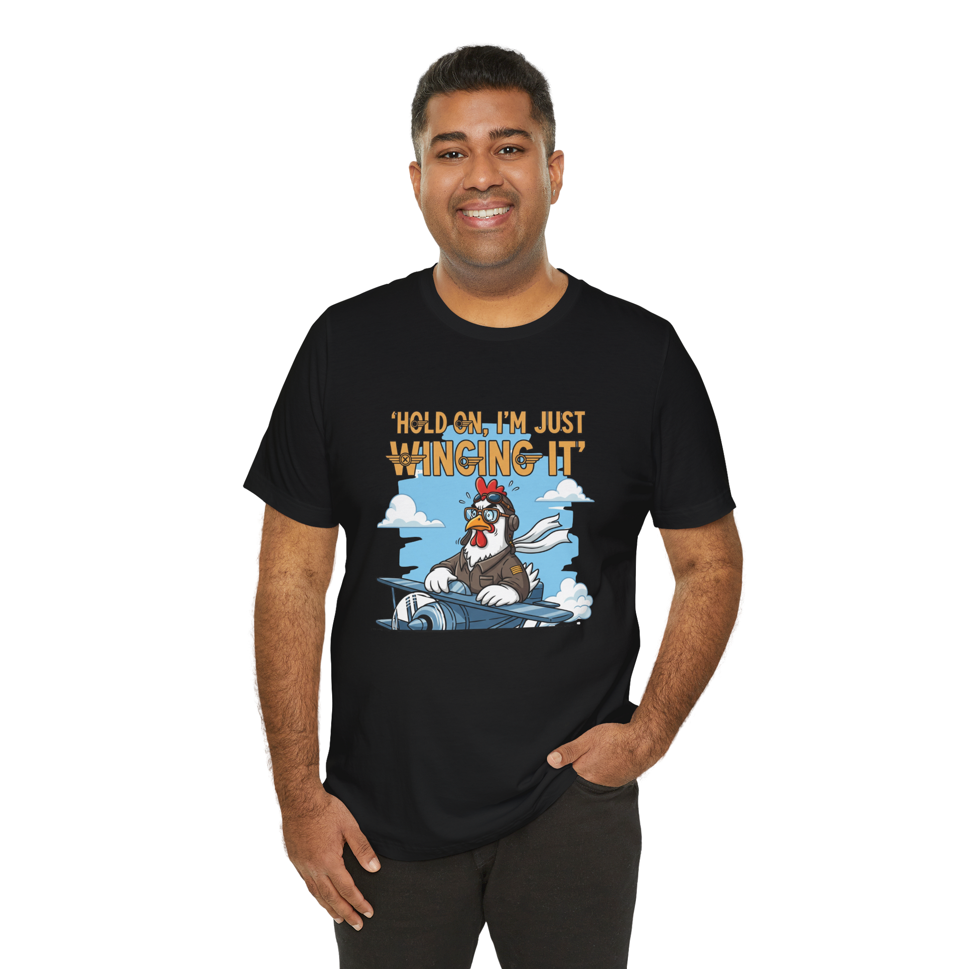 Man wearing a black t-shirt with a cartoon character and text on a white background