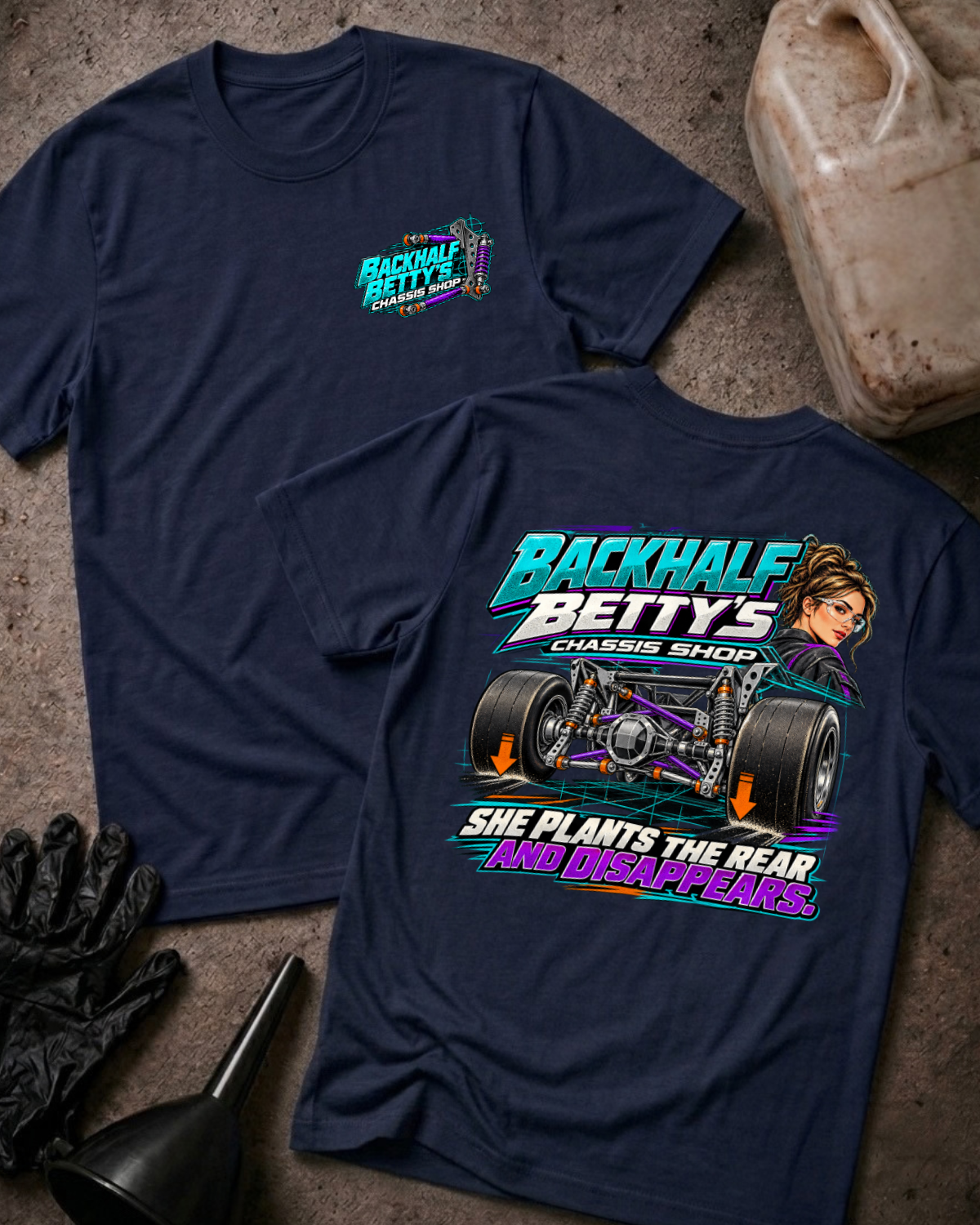 Navy Backhalf Betty’s T-shirt, front and back views, with small chest logo and large back graphic featuring a drag-racing chassis, wide tires, and woman illustration.