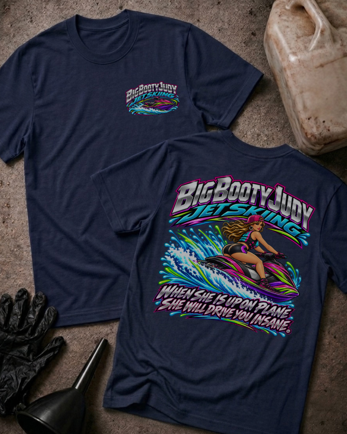 Navy Big Booty Judy Jet Skiing T-shirt, front and back views featuring a chest logo and woman-on-jet-ski graphic with the slogan “When she is up on plane she will drive you insane.”