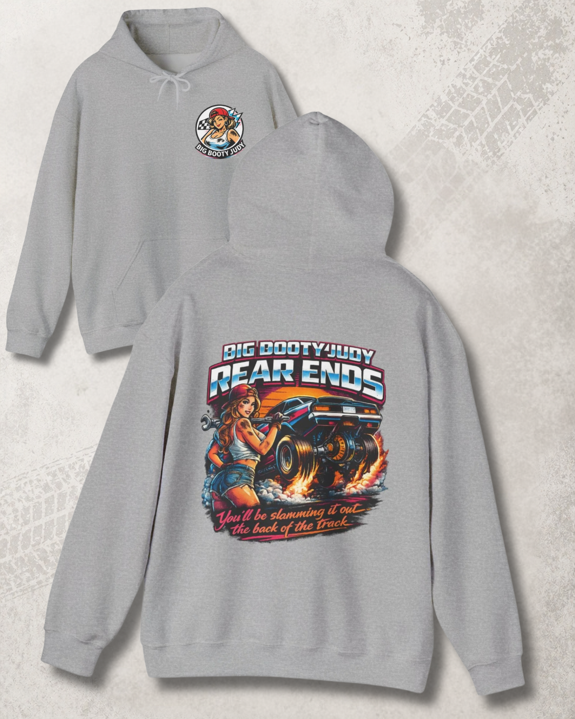 Gray hoodie with Big Booty Judy Rear Ends graphic design on a textured surface