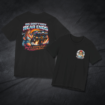 Black t-shirt with Big Booty Judy Rear Ends graphic design on front and back on a dark textured background