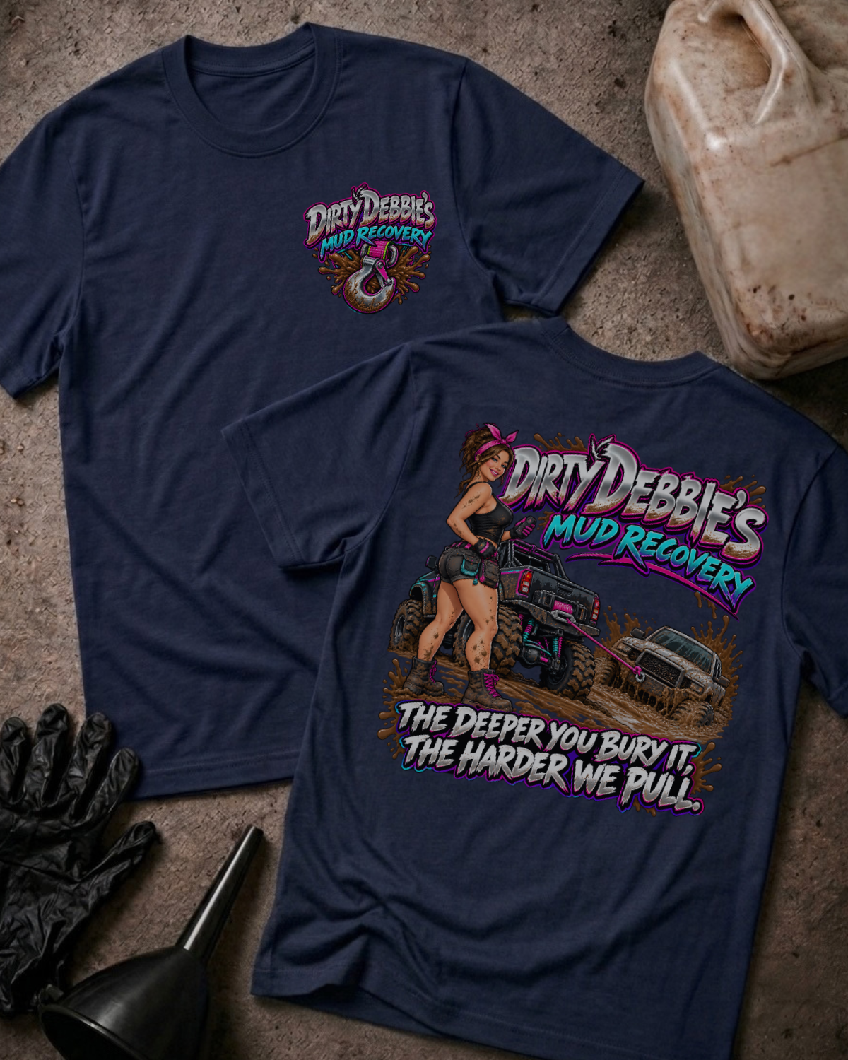 Navy Dirty Debbie’s Mud Recovery T-shirt, front and back views with a chest tow-hook logo and a woman beside trucks in mud, plus “The deeper you bury it, the harder we pull.”