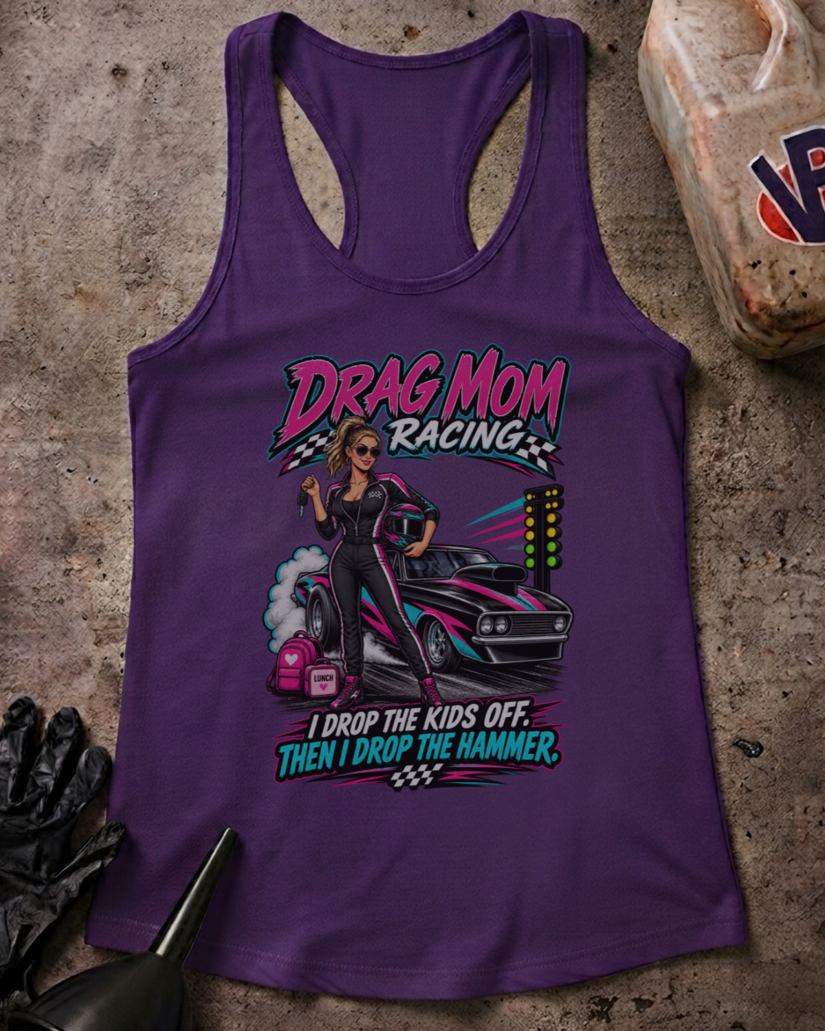 Flat lay of a solid purple Drag Mom Racing racerback tank with a drag racing graphic