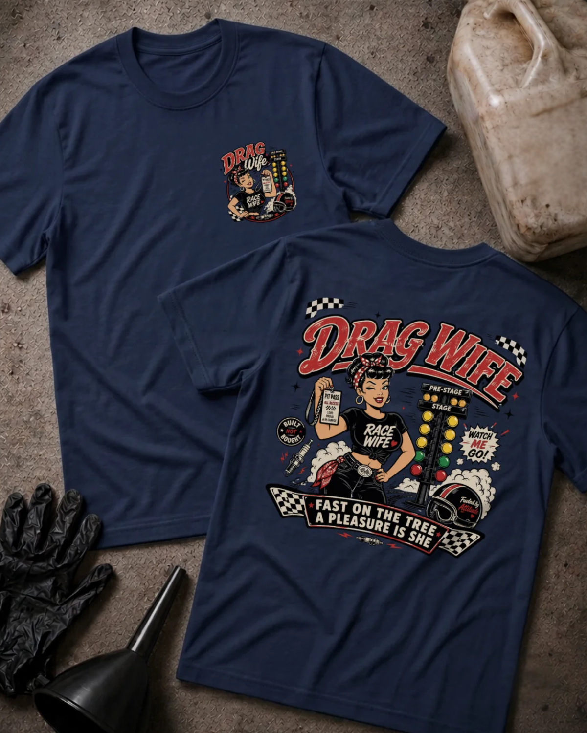 Front and back of Drag Wife navy T-shirt with chest logo, woman holding a pit pass beside drag racing lights, and “Fast on the tree, a pleasure is she” slogan.