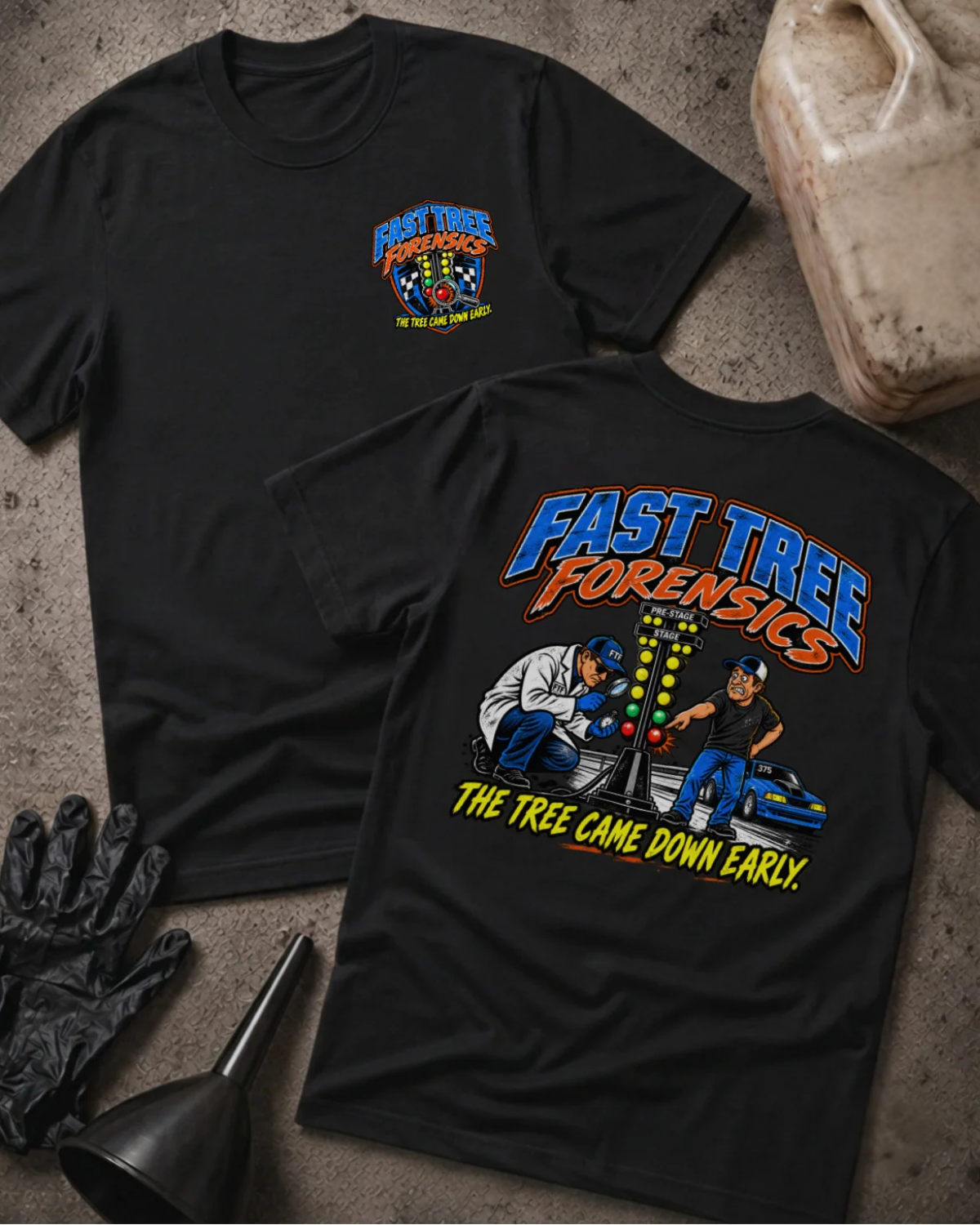 Front and back of Fast Tree Forensics black T-shirt with chest logo, two men examining a drag racing starting tree, and “The tree came down early” slogan.