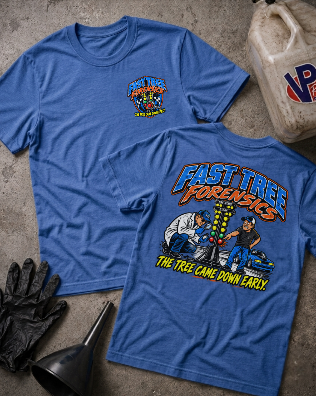 Two heather true royal graphic t-shirts with a colorful 'FAST TREE FORENSICS' logo on the front and a colorful drag racing graphic with 'FAST TREE FORENSICS THE TREE CAME DOWN EARLY' text on the back