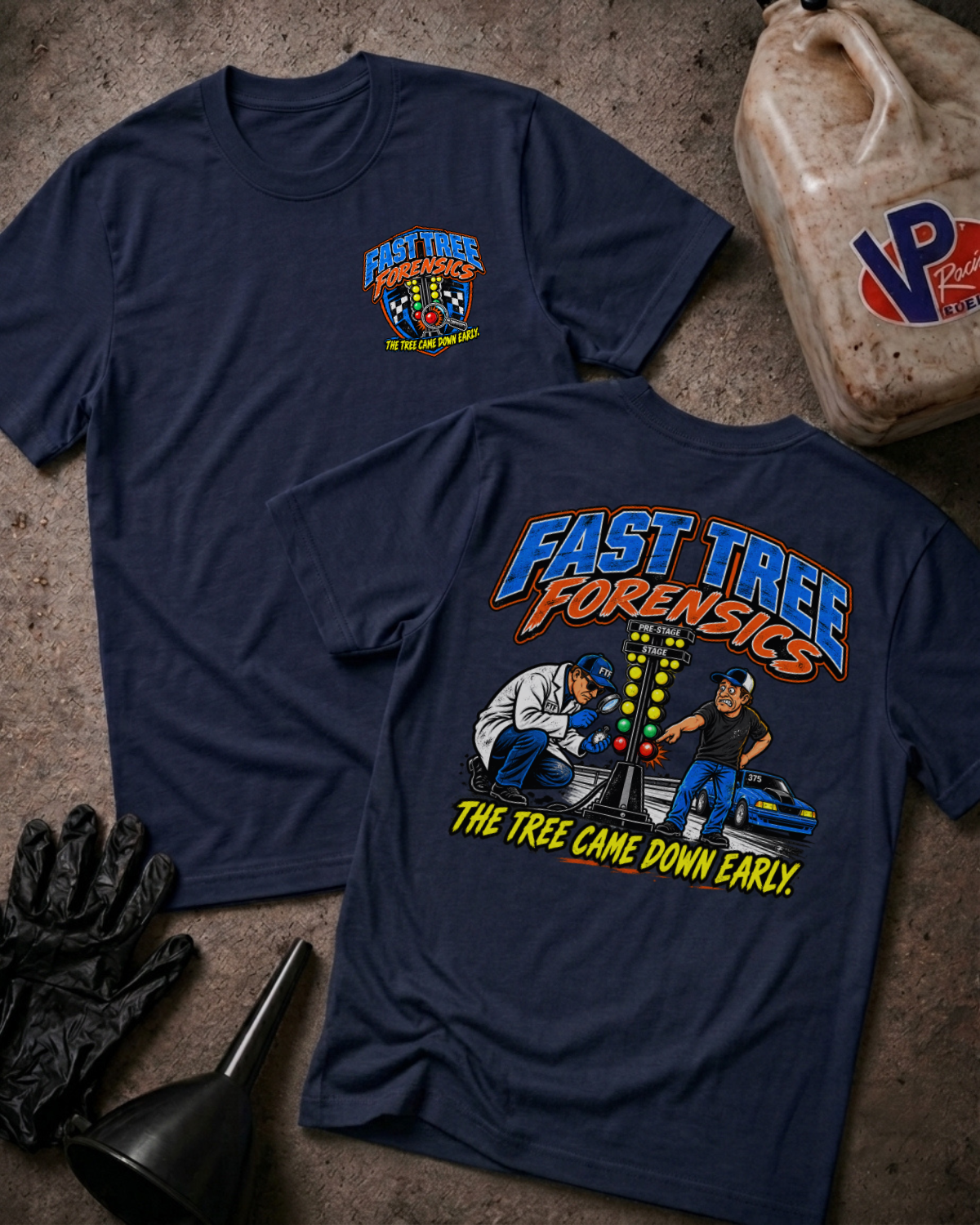 Two navy graphic t-shirts with a colorful 'FAST TREE FORENSICS' logo on the front and a colorful drag racing graphic with 'FAST TREE FORENSICS THE TREE CAME DOWN EARLY' text on the back