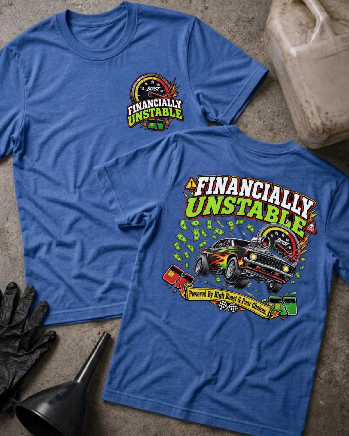 Front and back of Financially Unstable heather true royal T-shirt with chest logo, flame-painted muscle car, boost gauge, flying cash, and “Powered by high boost & poor choices” slogan.