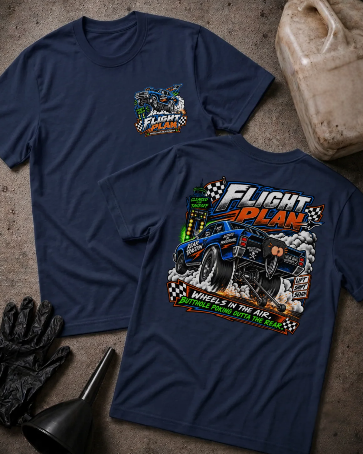 Front and back of Flight Plan navy T-shirt with chest logo, blue drag car performing a wheelstand, and “Wheels in the air, butthole poking outta the rear” slogan.