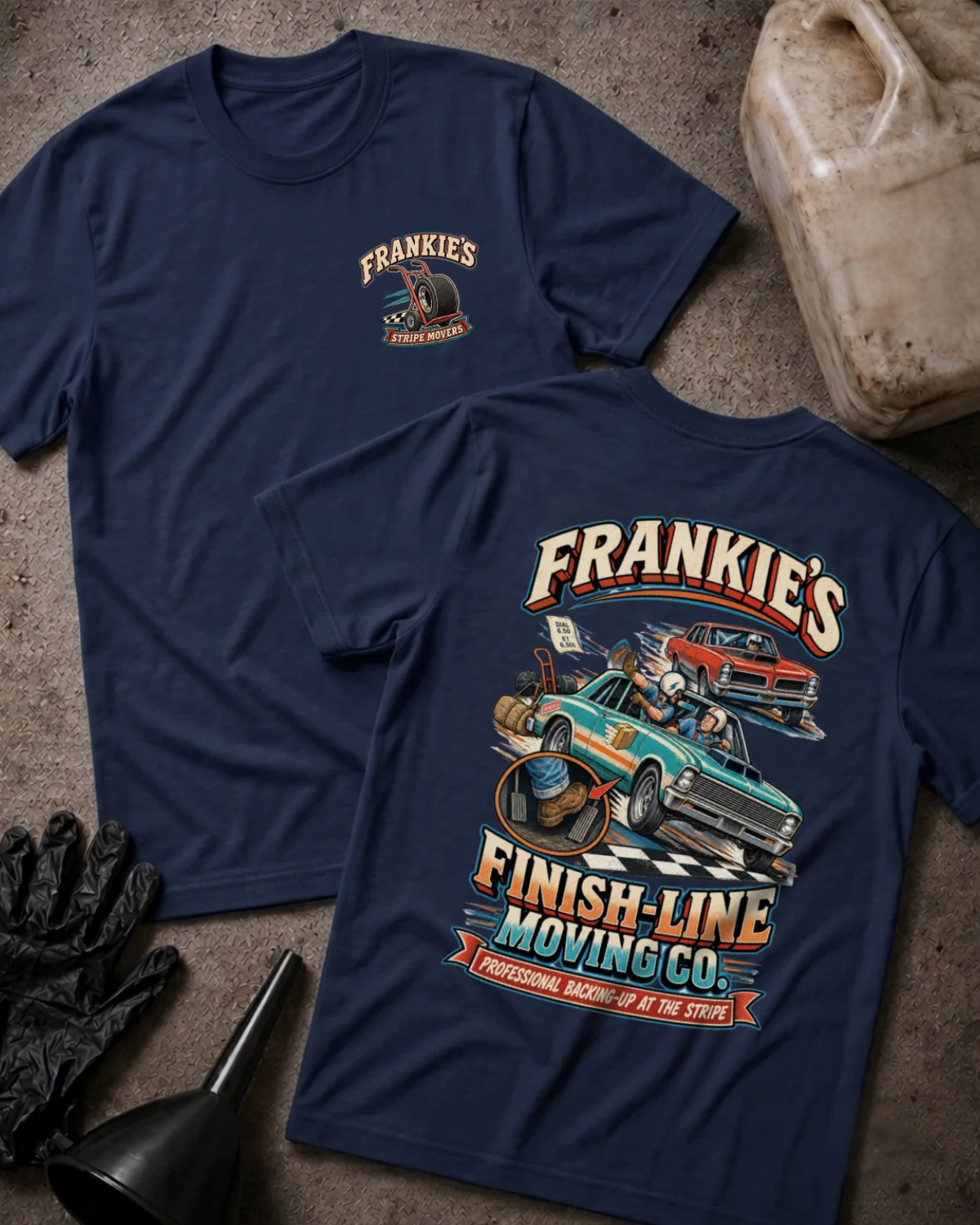 Front and back of Frankie’s Finish-Line Moving Co. navy T-shirt with chest logo, green and red race cars at a checkered finish line, and “Professional backing-up at the stripe” slogan.