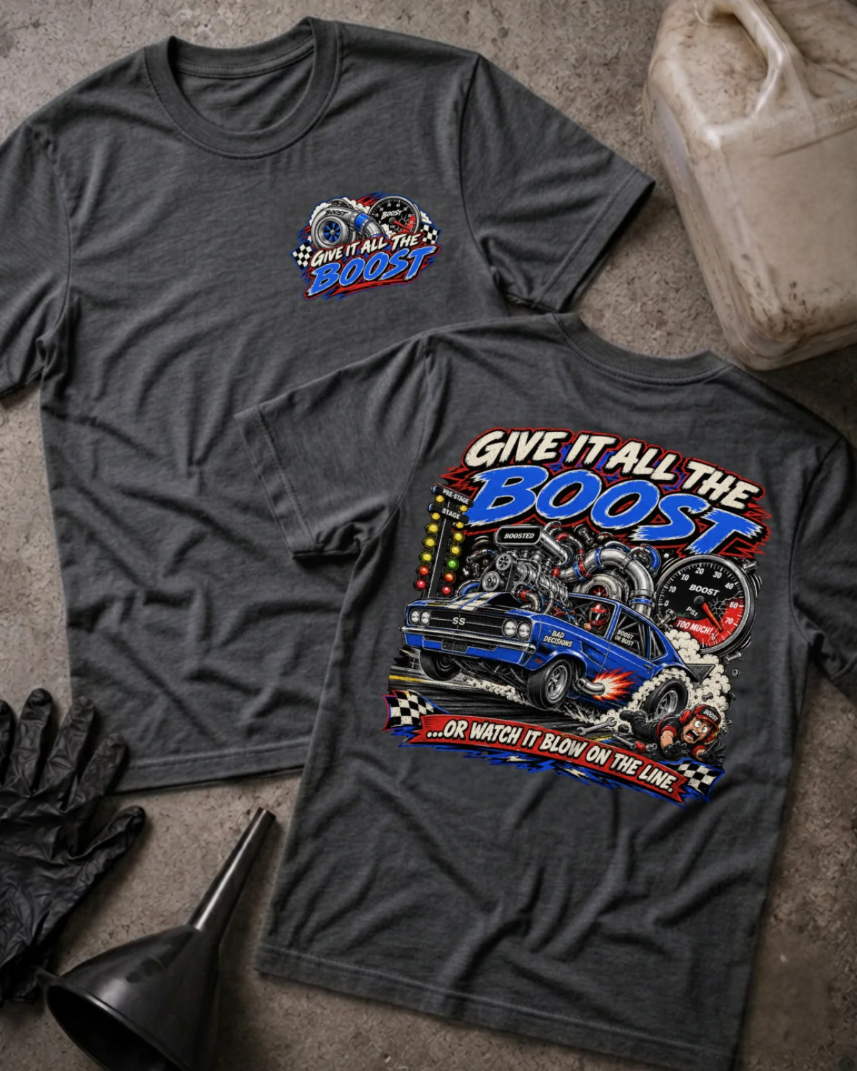 Front and back of Give It All the Boost dark grey heather drag racing T-shirt with chest logo, blue turbocharged race car, boost gauge, staging lights, and “Or watch it blow on the line” slogan.