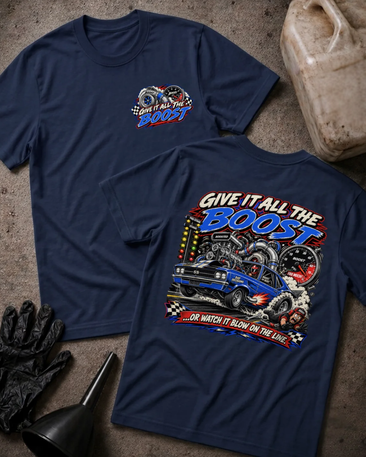 Front and back of Give It All the Boost navy drag racing T-shirt with chest logo, blue turbocharged race car, boost gauge, staging lights, and “Or watch it blow on the line” slogan.