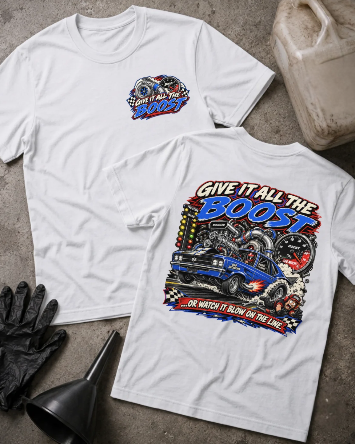 Front and back of Give It All the Boost white drag racing T-shirt with chest logo, blue turbocharged race car, boost gauge, staging lights, and “Or watch it blow on the line” slogan.