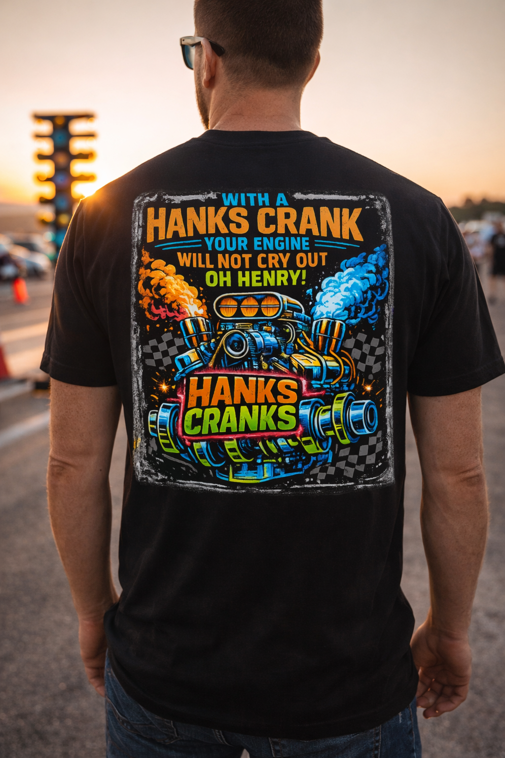 Back view of black Hanks Cranks drag racing t-shirt showing large supercharged engine graphic and racing slogan at the drag strip.