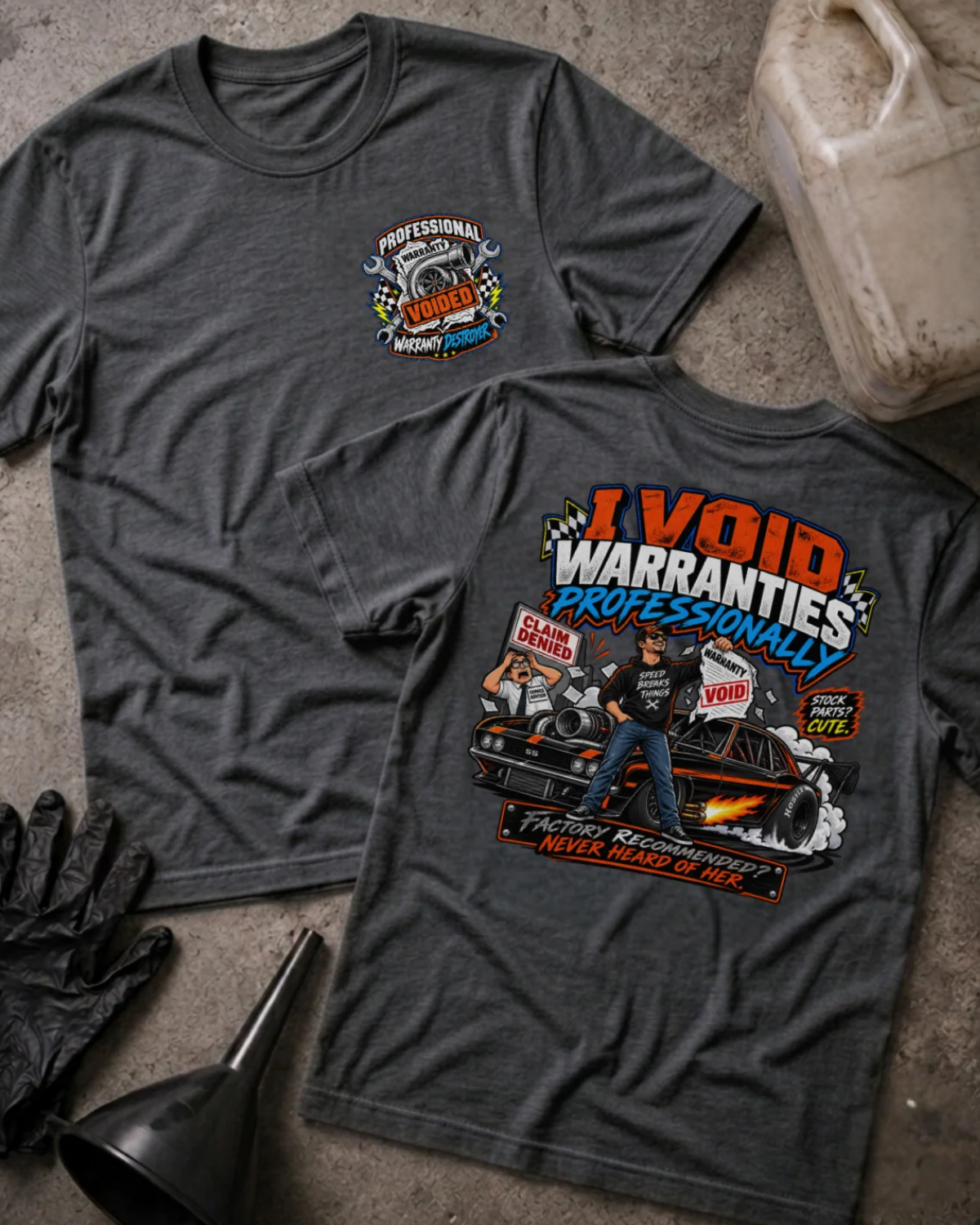 Front and back of I Void Warranties Professionally dark grey heather T-shirt with chest logo, man beside a modified muscle car, and “Factory recommended? Never heard of her” slogan.