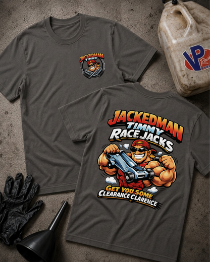 Two dark gray graphic t-shirts displayed flat on a textured concrete surface, showing both the front chest logo and the back graphic design for 'Jackedman Race Jacks'. A black glove, funnel, and a dirty plastic jug are styled as props.