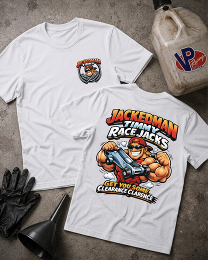 Two white graphic T-shirts laid flat on a gray concrete surface, with a black funnel, black gloves, and a VP Racing jug nearby. The front shirt shows a small chest graphic, and the back shirt shows a large colorful 'Jackedman Timmy Race Jacks' cartoon graphic.