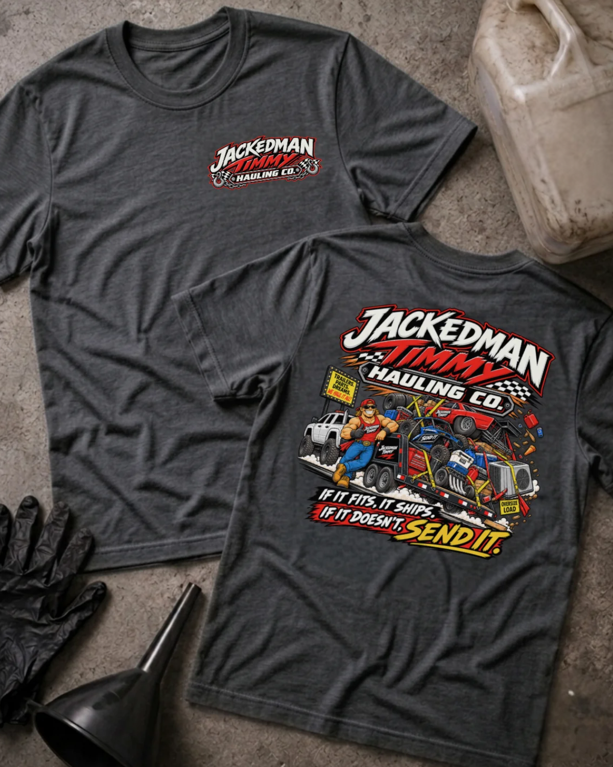 Front and back of Jackedman Timmy Hauling Co. dark grey heather T-shirt with chest logo, man beside an overloaded trailer, and “If it fits, it ships. If it doesn’t, send it.” slogan.