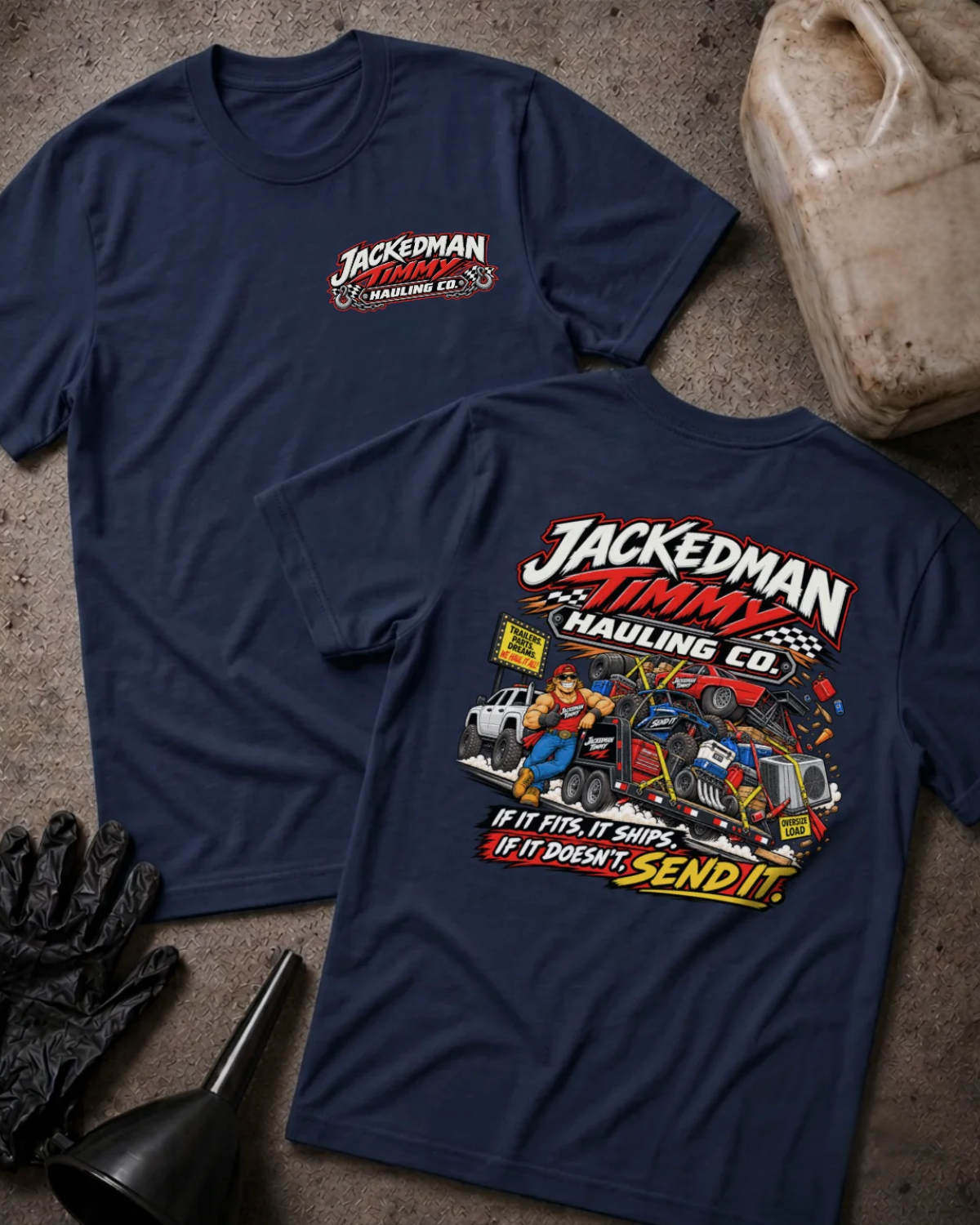 Front and back of Jackedman Timmy Hauling Co. navy T-shirt with chest logo, man beside an overloaded trailer, and “If it fits, it ships. If it doesn’t, send it.” slogan.