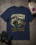 A navy blue graphic t-shirt featuring a muscular man flexing next to a muscle car with the text 'JACKEDMAN TIMMY' and 'You will go down fast when you get Jacked by Timmy'. The shirt is displayed in a flat-lay arrangement on a gray concrete floor with a black oil change funnel, a black glove, and a plastic jug of VP Brand motor oil.
