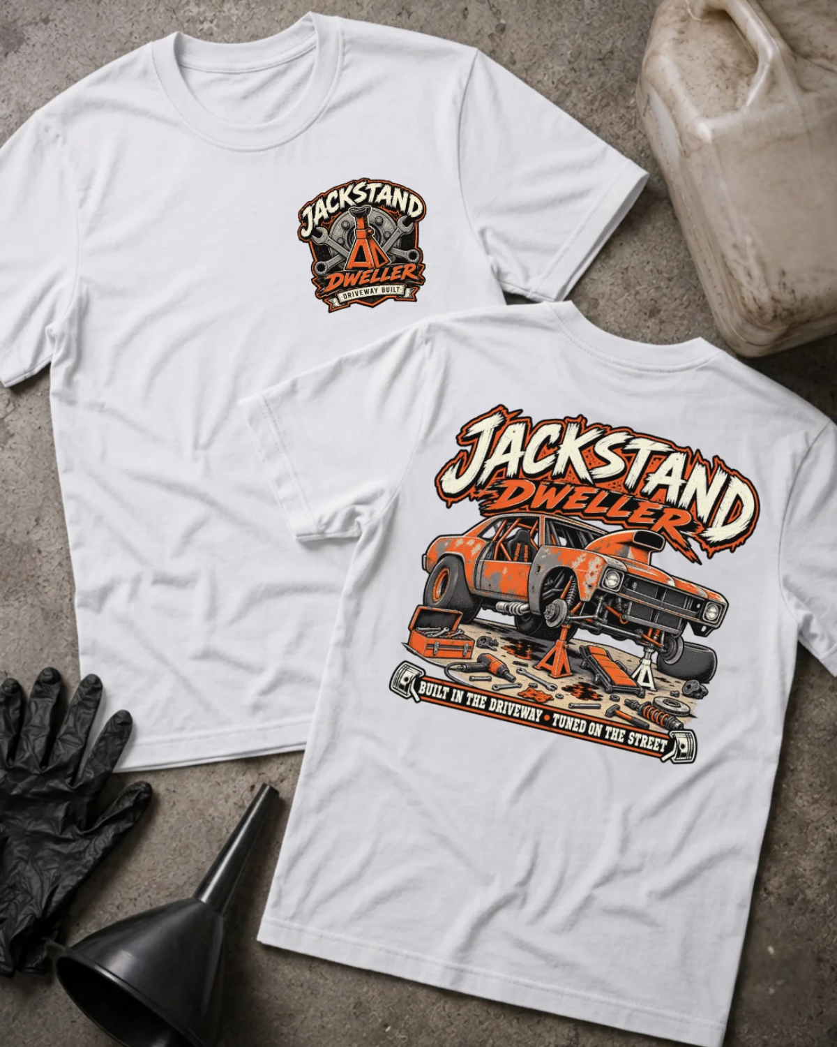 Front and back of white Jackstand Dweller T-shirt with a small chest emblem and large orange project car on jack stands graphic on the back.