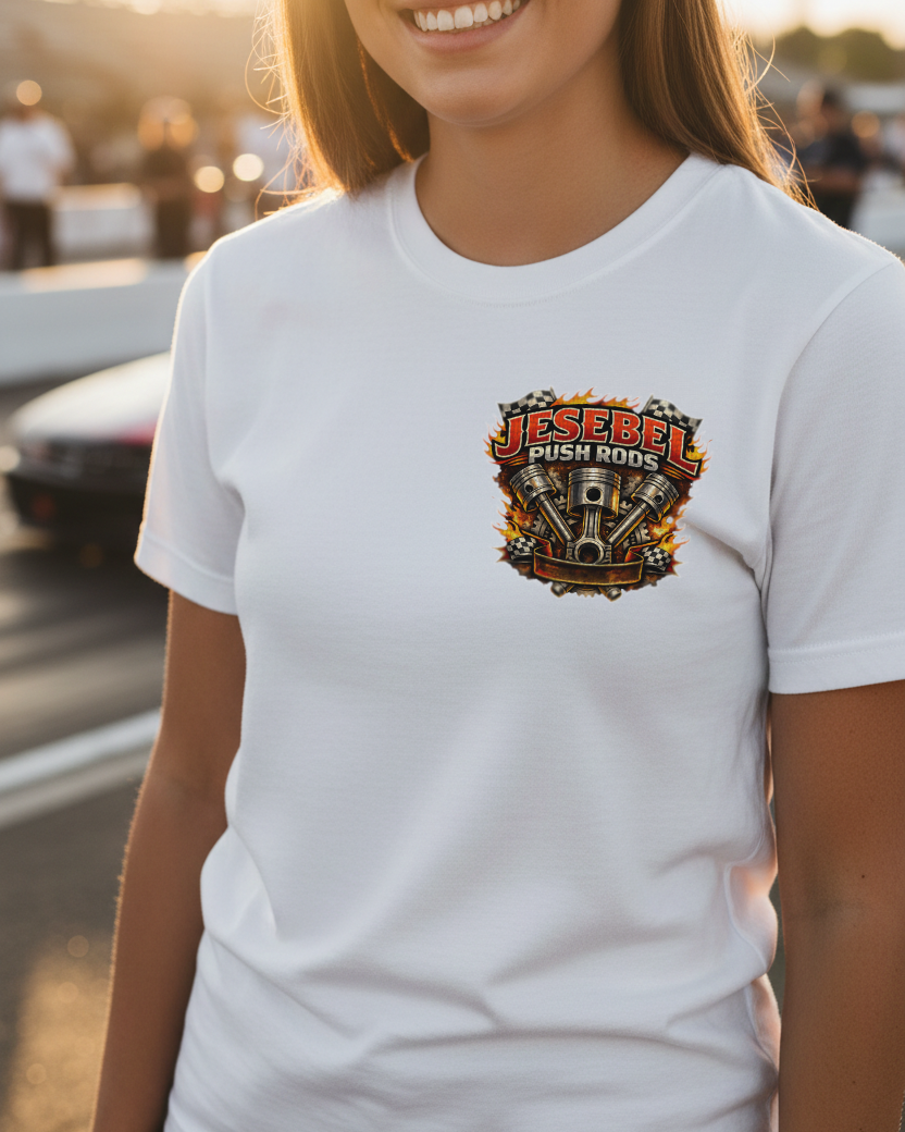 Woman wearing a white t-shirt with a colorful logo and 'Jesebel Push Rods' text, standing outdoors.