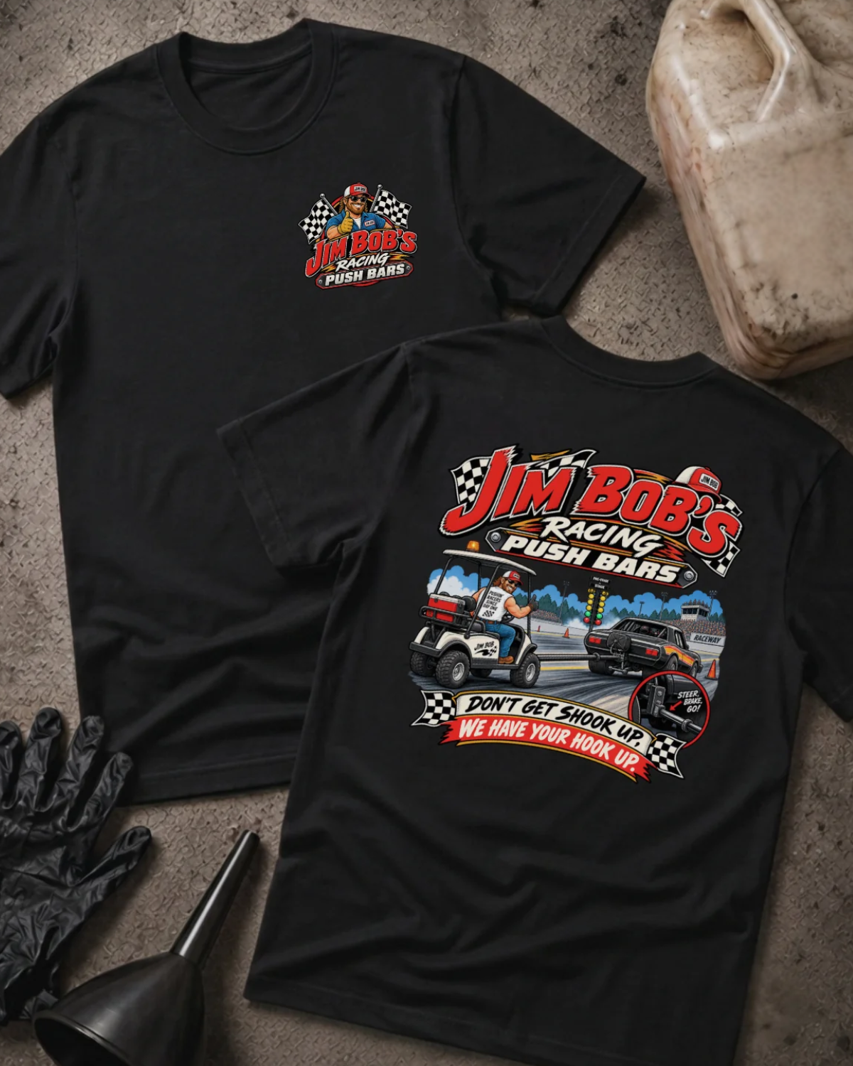 Front and back of Jim Bob’s Racing Push Bars black T-shirt with chest logo, man driving a golf cart behind a drag car, and “Don’t get shook up. We have your hook up.” slogan.