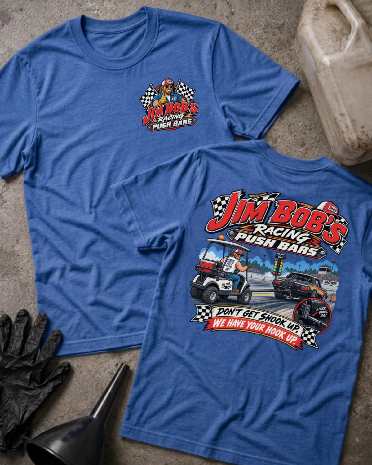 Front and back of Jim Bob’s Racing Push Bars heather true royal T-shirt with chest logo, man driving a golf cart behind a drag car, and “Don’t get shook up. We have your hook up.” slogan.