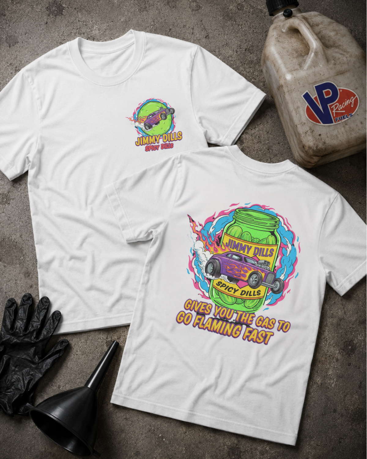 White t-shirt with 'Jimmy Dlls Spicy Dills' logo on the front and a graphic design of a pickle jag and hot rod with text 'Jimmy Dills Spicy Dills Gives You The Gas To GoFlaming Fast'