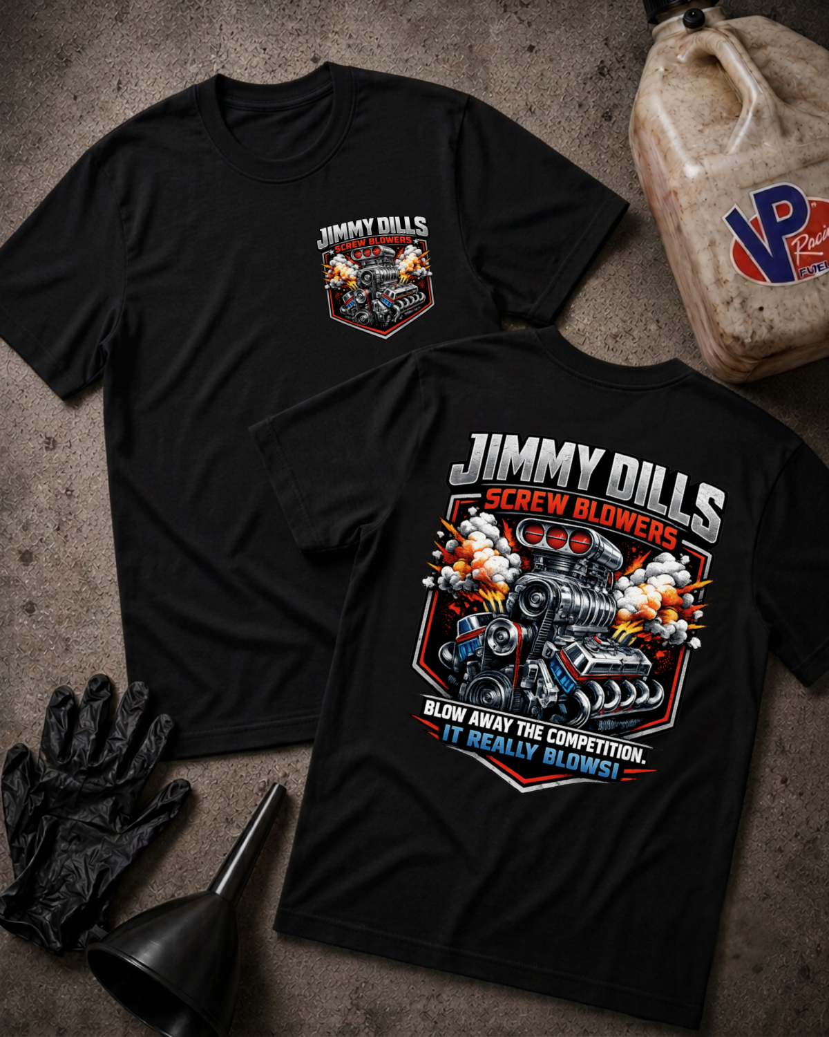 Two black graphic T-shirts laid flat on a textured gray surface, showing the front and back designs. The shirts feature a motorcycle and engine graphic with the text 'JIMMY DILLS SCREW BLOWERS' and 'BLOW AWAY THE COMPETITION.