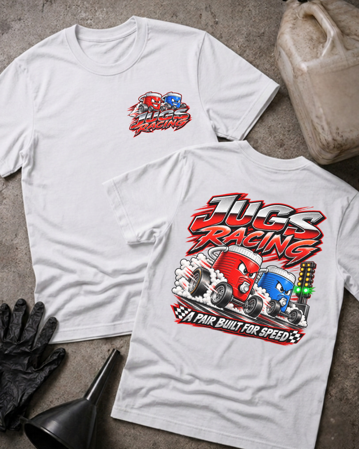 White Jugs Racing T-shirt, front and back views featuring red and blue cartoon jugs drag racing beside a starting light, with the slogan “A pair built for speed.”