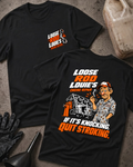 Black Loose Rod Louie’s Engine Repair T-shirt, flat lay with the front chest logo and back cartoon mechanic and cracked engine block design reading “If It’s Knocking, Quit Stroking,” styled with gloves, a funnel, and an oil jug.
