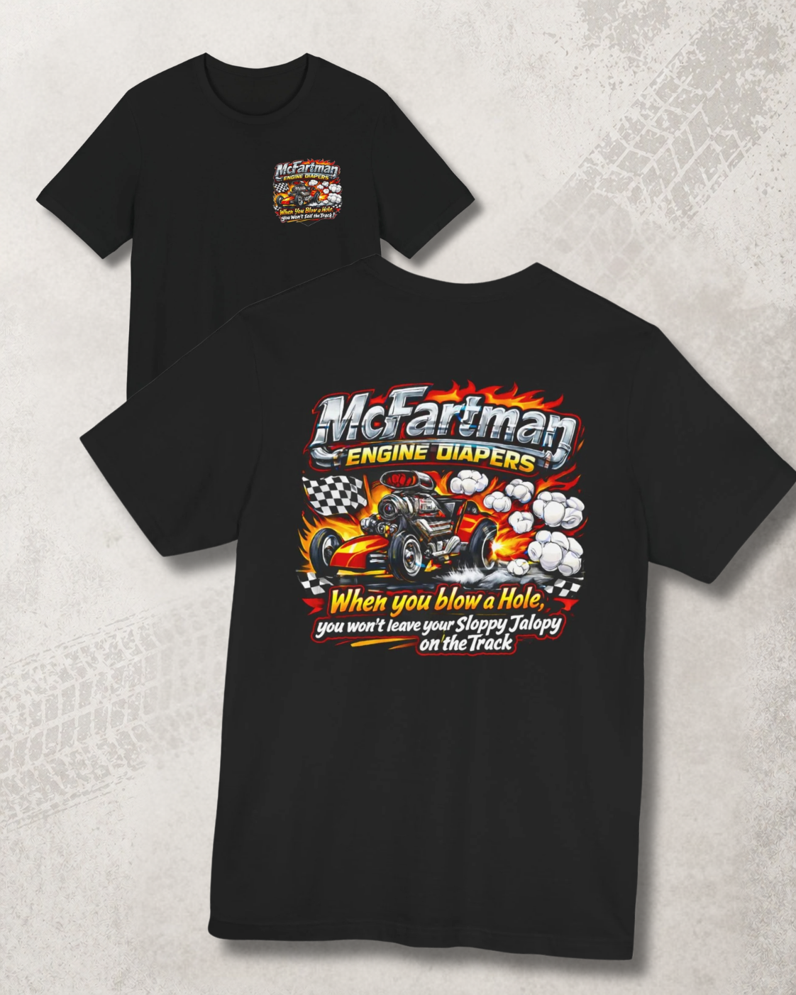 Black t-shirt with colorful graphic and 'McFartman Engine Diapers When you blow a hole, you won't leave your Sloppy Jalopy on the Track' text, front and back flat lay view