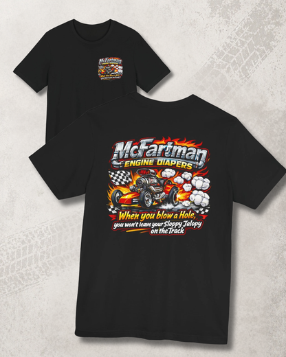 Black t-shirt with colorful graphic and 'McFartman Engine Diapers When you blow a hole, you won't leave your Sloppy Jalopy on the Track' text, front and back flat lay view