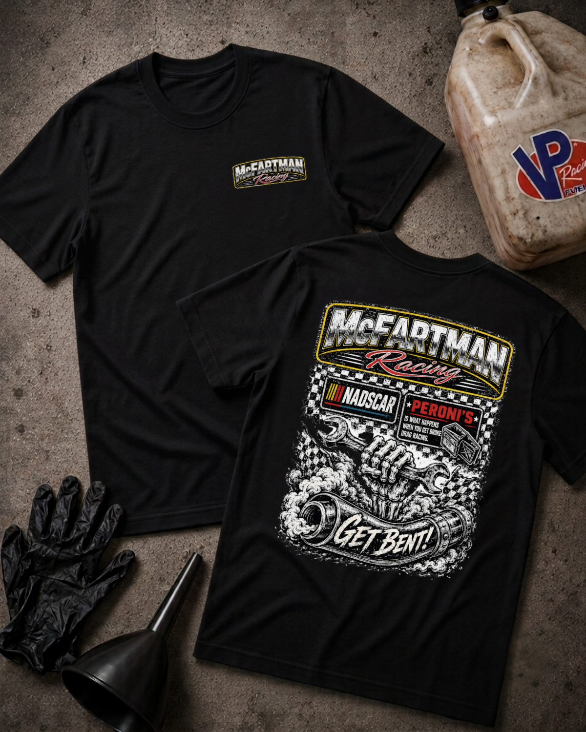Two black short-sleeve t-shirts laid flat on a textured gray surface, with racing-themed graphics. The front shirt has a small chest logo reading McEartman Racing, and the back shirt has a large graphic with 'McEartman Racing,' 'NADSCAR,' 'Get Bent!,' and a checkered pattern.
