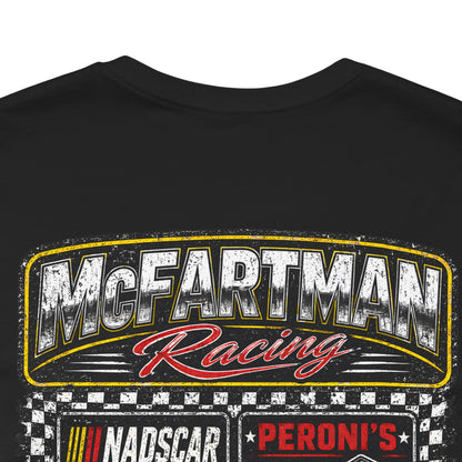 Close-up detail of distressed McFartman Racing “Get Bent!” drag racing shirt graphic showing gritty vintage texture and DTG print detail on black fabric.