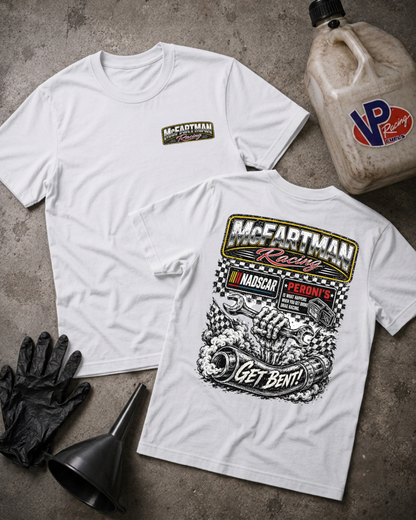 Two white short-sleeve t-shirts laid flat on a gray concrete surface, showing the front and back graphics. The front shirt has a small McFartman Racing logo on the left chest, and the back shirt has a large black-and-white racing illustration with the text 'McFartman Racing', 'Get Bent!', and NADSCAR branding.