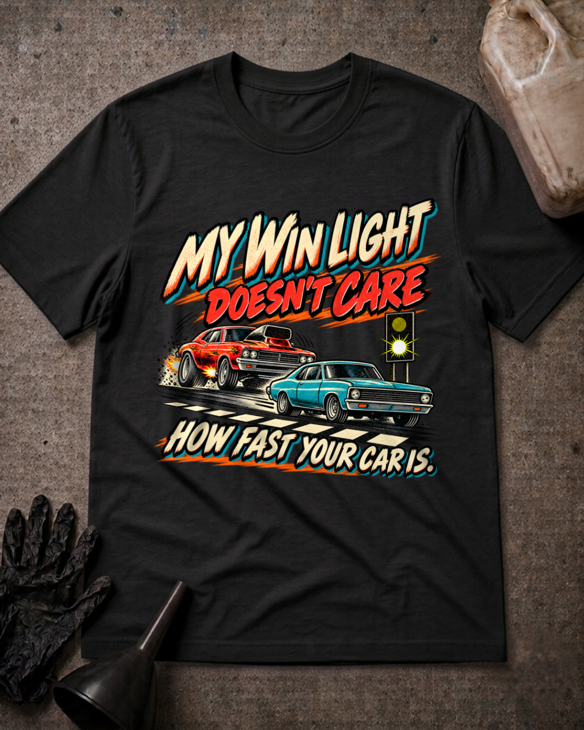 Black My Win Light bracket racing T-shirt, front flat lay with red and teal classic drag cars, glowing win light, and “My win light doesn’t care how fast your car is.”