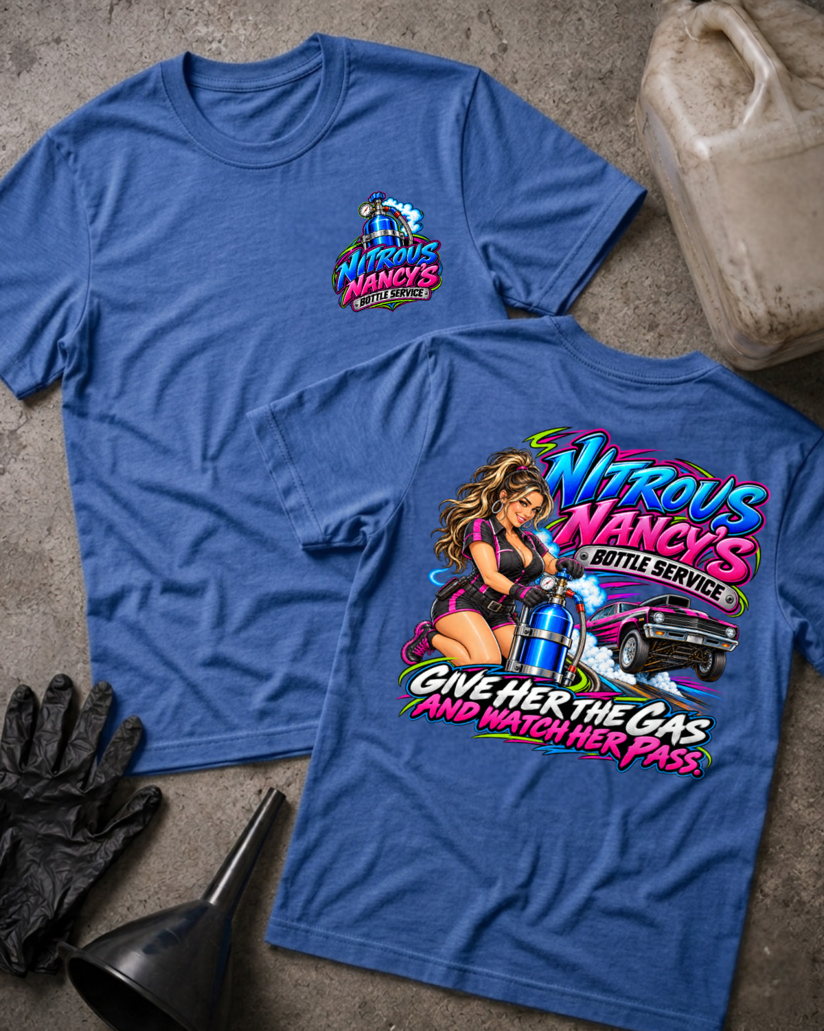 Heather true royal blue Nitrous Nancy’s T-shirt, front and back: small nitrous bottle chest emblem and neon woman, blue nitrous bottle and drag car graphic reading “Give her the gas and watch her pass.”