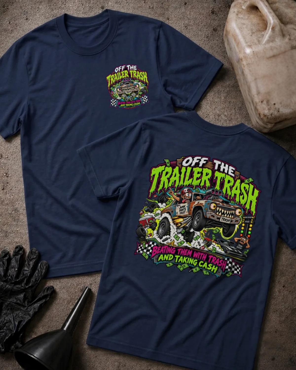 Front and back of Off the Trailer Trash navy T-shirt with chest logo, rusty drag racing car amid smoke and cash, and “Beating them with trash and taking cash” slogan.