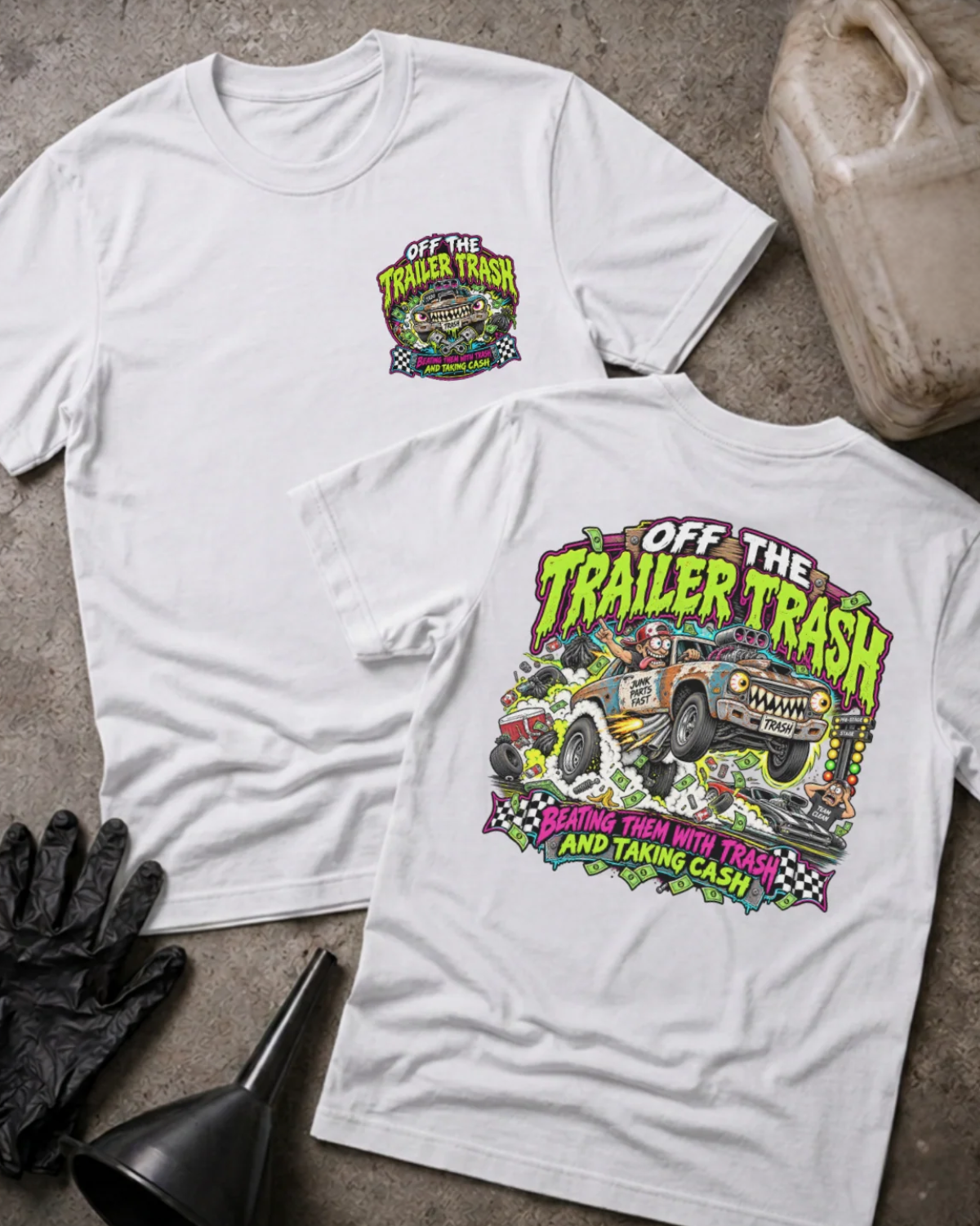 Front and back of Off the Trailer Trash white T-shirt with chest logo, rusty drag racing car amid smoke and cash, and “Beating them with trash and taking cash” slogan.