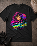 Black T-shirt laid flat with a neon woman racer, racing helmet, muscle car and sunset graphic reading “Pretty in the Pits. Nasty on the Hits.”