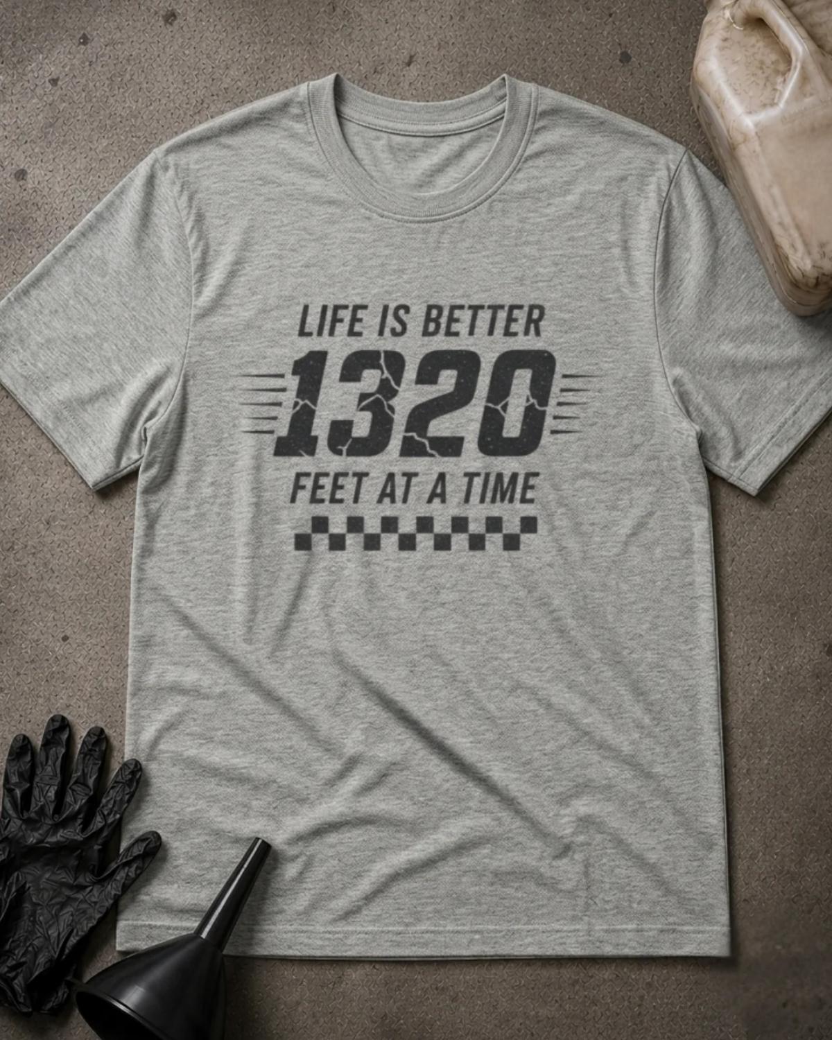 Athletic Heather gray 1320 Feet drag racing T-shirt featuring black “Life is better 1320 feet at a time” lettering, cracked-effect numbers, speed lines, and a checkered pattern.