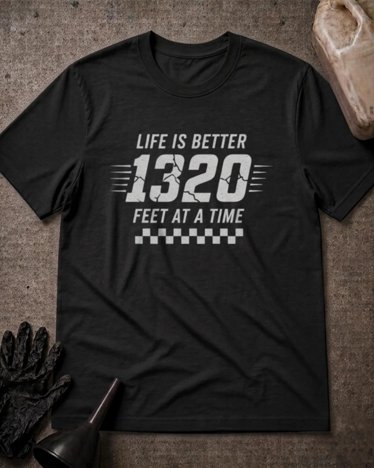 Black 1320 Feet drag racing T-shirt featuring white “Life is better 1320 feet at a time” lettering, cracked-effect numbers, speed lines, and a checkered pattern.