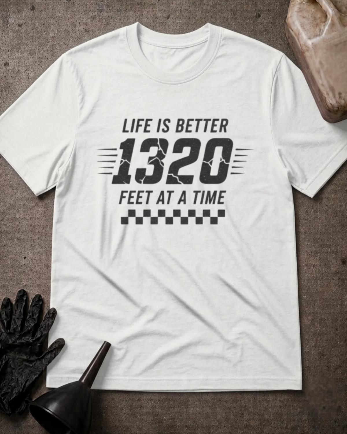 White 1320 Feet drag racing T-shirt featuring black “Life is better 1320 feet at a time” lettering, cracked-effect numbers, speed lines, and a checkered pattern.⠋